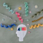 Creative illustration highlighting ADHD awareness with colorful brain imagery.